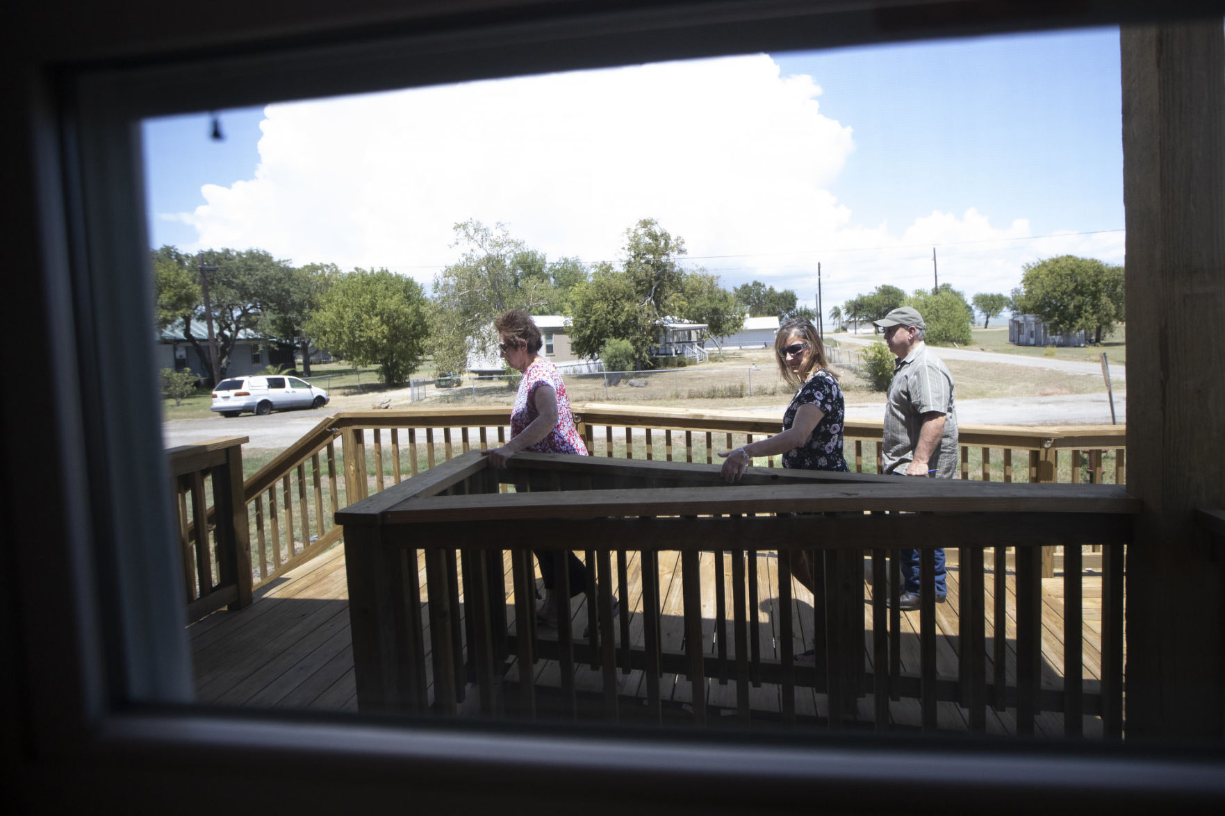 Austwell family receives keys to new home